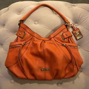 Etienne Aigner leather purse - brunt orange